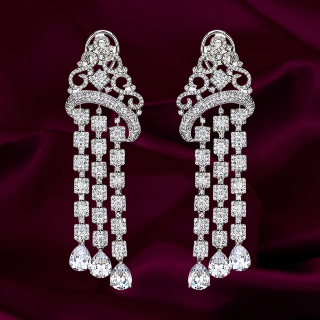 
Our glamorous Roopsi drop earrings are the perfect way to add glamorous sparkle to every look. 

Gold plated brass 
Made with Cubic Zirconia 
Pushback Earring PostsJaipur RoseJaipur RoseEarringsRoopsi Statement Earrings Designer Indian Jewelry by Jaipur Rose