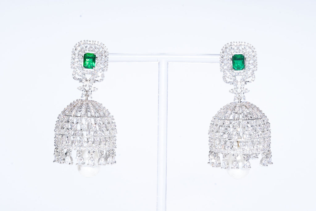 These dazzling Emerald Jhumkas perfect for adding an extra dose of qlamour to any look. Designed for women who lead inspired lives these earrings are a must-have forJaipur RoseJaipur RoseEarringsBhumika Emerald Jhumka Designer Indian Earrings By Jaipur Rose Modern 