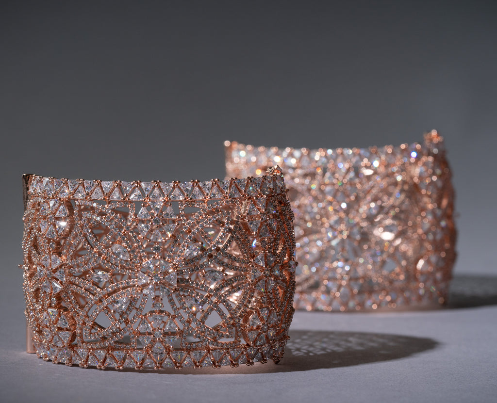 Make a statement in our dazzling Rozana cuff in rose gold or as we say in India kada bracelet perfect for adding a perfect touch of sparkle to every look.

Size 2.6
Jaipur RoseJaipur RoseBraceletsRozana Crystal Embellished Cuff - Rose Gold Kada by Jaipur Rose Modern