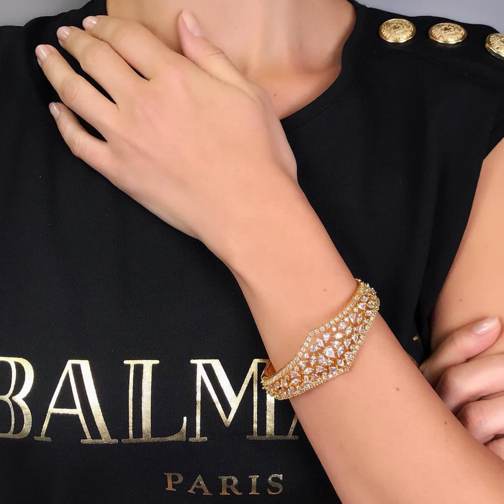 
Complete every look with our intricately handcrafted Sumaya Bracelet. It has the perfect amount of sparkle to add glamour to every look! 

Made with Cubic Zirconia
Jaipur RoseJaipur RoseBraceletsSumaya Statement Bracelet Yellow Gold Plated Luxury Indian Jewelry | J