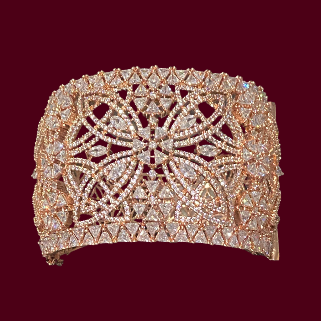 Make a statement in our dazzling Rozana cuff in rose gold or as we say in India kada bracelet perfect for adding a perfect touch of sparkle to every look.

Size 2.6
Jaipur RoseJaipur RoseBraceletsRozana Crystal Embellished Cuff - Rose Gold Kada by Jaipur Rose Modern